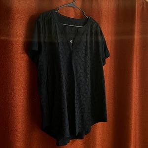 A women’s dressy tea longer in the back